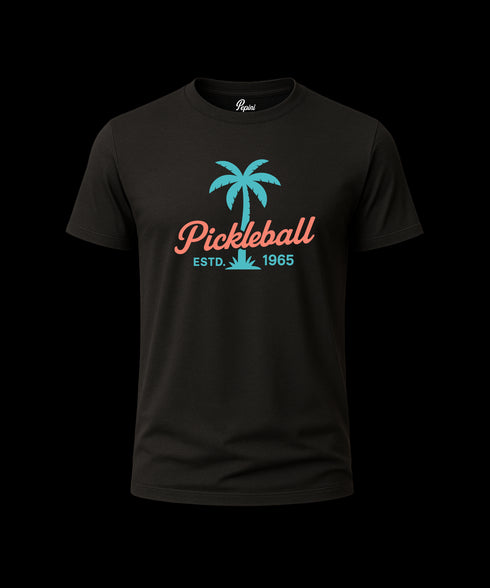 Black t-shirt with pickleball design featuring a palm tree on a white background